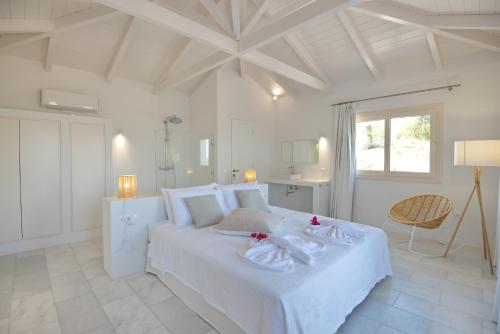 Кровать или кровати в номере Anemone Villas hotel