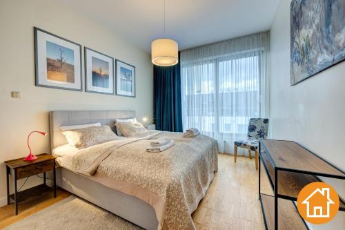 Cama o camas de una habitación en Penthouse 100qm by Golden Tulip 3 Szlafzimmer 2 Bäder Terrasse Parking Free