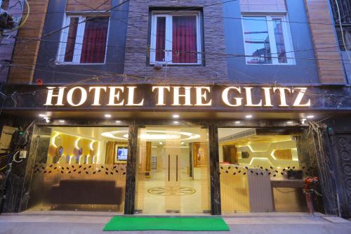 a hotel the flu sign in front of a building at Hotel Glitz - Walk in from New Delhi Railway Station in New Delhi