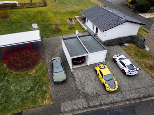 Fotografie z fotogalerie ubytování Racing-Chalet (Ferienhaus) v destinaci Meuspath