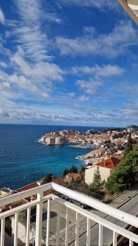 a view of the ocean from a balcony at Apartment Karmen in Dubrovnik