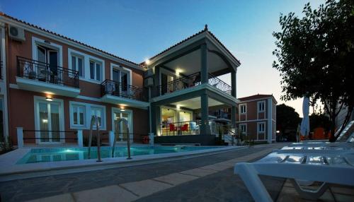 a large building with a pool in front of it at SunSea Hotel Petra in Petra