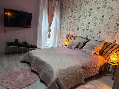Postel nebo postele na pokoji v ubytování Loft serenity du condroz