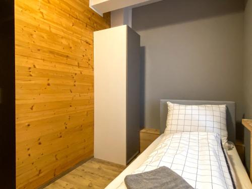 Postel nebo postele na pokoji v ubytování W&G Hotel