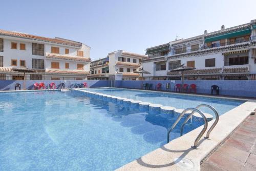 Πισίνα στο ή κοντά στο rentafive Terraza Piscina Parking Cerca Playa