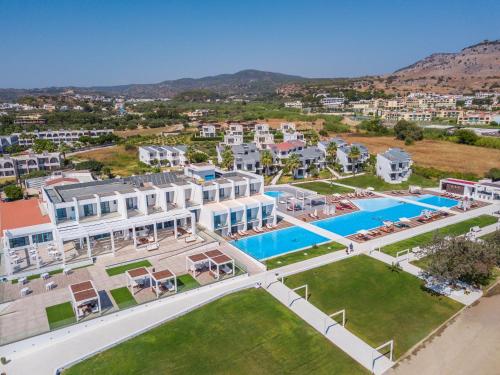 an aerial view of a resort with a swimming pool at Kamari Beach in Lardos