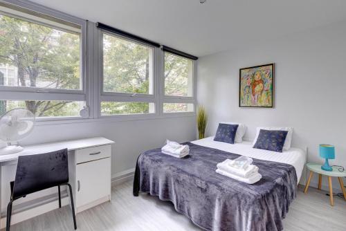 Tempat tidur dalam kamar di 234 Office New York - Apartment in Paris