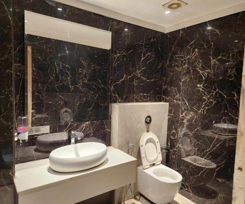 Un baño de Hotel Levelup Signature