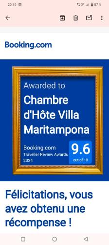 a screenshot of a website with a picture in a gold frame at Chambre d'Hôte Villa Maritampona in Antsirabe