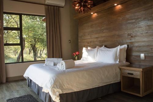 Postel nebo postele na pokoji v ubytování Duiker lodge
