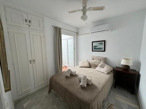 En eller flere senge i et værelse på 59 Beautiful Mijas Playa Club