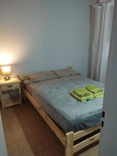 En eller flere senge i et værelse på DUPLEX CENTRICO