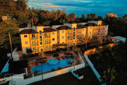 an aerial view of a resort with a swimming pool at Ria Aparta Hotel in San Felipe de Puerto Plata