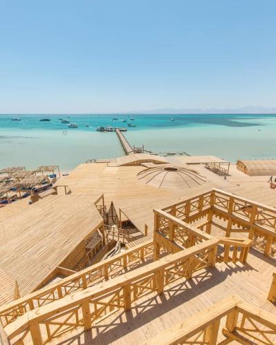 a view of a beach with the ocean in the background at orange bay in Hurghada