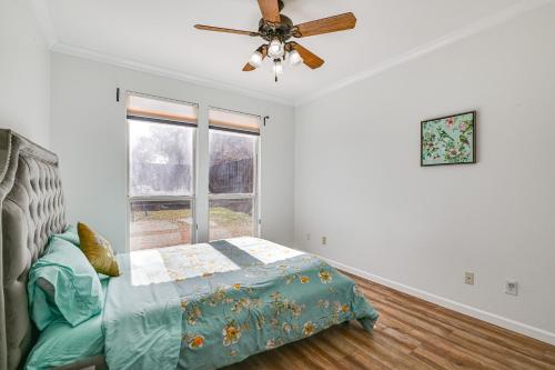a bedroom with a bed and a ceiling fan at Spacious Frisco Family Home Fenced Yard and Office! in Frisco