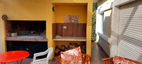 a room with a table and a table and a table and a table at Home Beach Chapadmalal in Chapadmalal