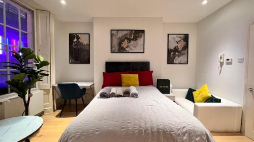 a bedroom with a large bed in a room at Mayfair Stylish central London Modern Suite in London