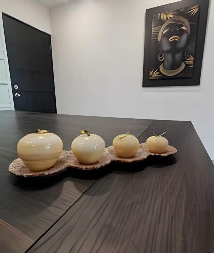 a table with three candles on top of it at Dream Lagoons Veracruz in Veracruz