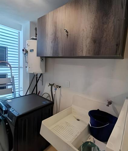 a kitchen with a counter top and a cabinet at Dream Lagoons Veracruz in Veracruz