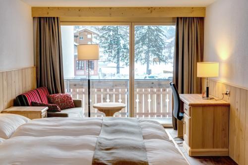 Postel nebo postele na pokoji v ubytování Hotel City