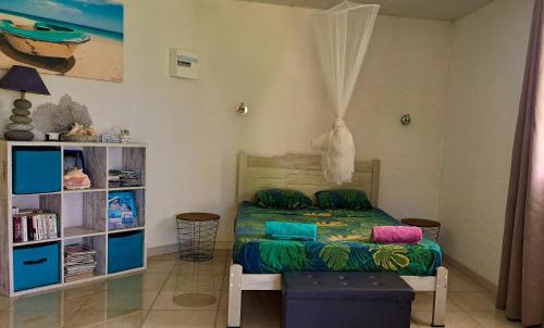 Ένα ή περισσότερα κρεβάτια σε δωμάτιο στο Kaz Alberto Guadeloupe