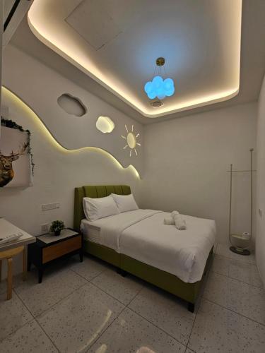 Katil atau katil-katil dalam bilik di Ipoh Young Villa - Hotel Inspired