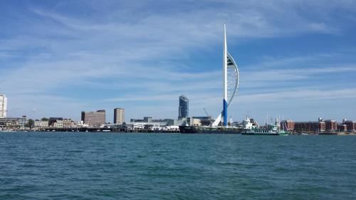 a view of a city with a skyscraper in the water at Duke of Buckingham in Portsmouth