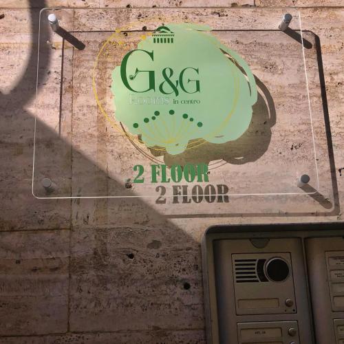a sign for a hour show on a wall at G&G ROOMS in Palermo