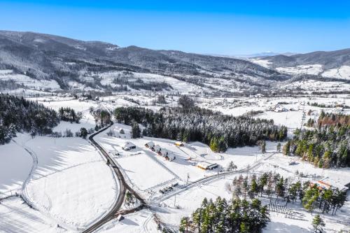 an aerial view of a ski resort in the snow at Wierchy Beskidu in Dobra