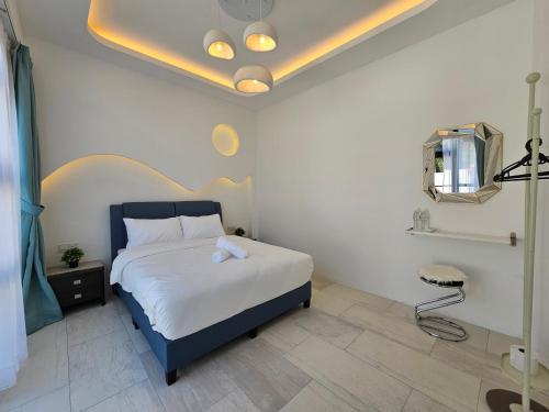 Katil atau katil-katil dalam bilik di Ipoh Young Villa - Hotel Inspired