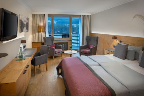 Postel nebo postele na pokoji v ubytování Arabella Alpenhotel am Spitzingsee, a Tribute Portfolio Hotel