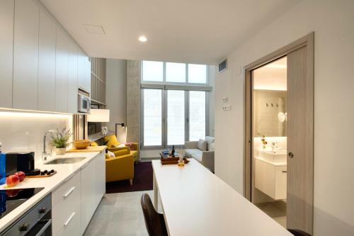 Kuchyň nebo kuchyňský kout v ubytování Calm Apartments