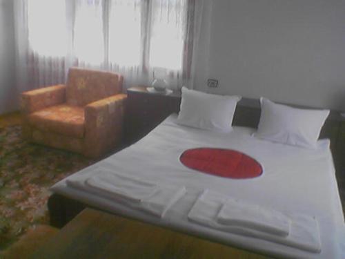 Ένα ή περισσότερα κρεβάτια σε δωμάτιο στο Guest House AHP