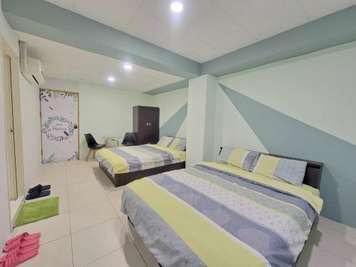 Postel nebo postele na pokoji v ubytování Good Fit Homestay