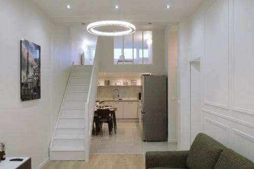 Kuchyň nebo kuchyňský kout v ubytování Appartement mezzanine contemporain hypercentre Caen - chez Jannie