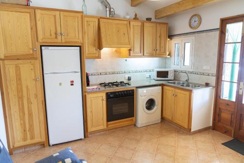 Kuchyň nebo kuchyňský kout v ubytování La Casa del Pescador