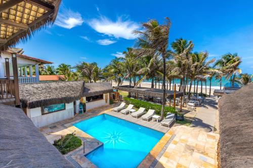 Бассейн в Vila Coqueiros Boutique Hotel или поблизости