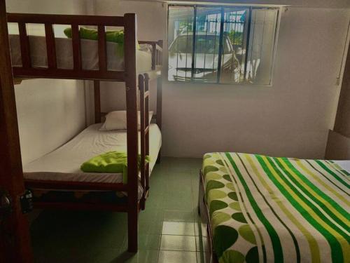 Katil atau katil-katil dalam bilik di Casa en Misahualli - Misahualli HOME