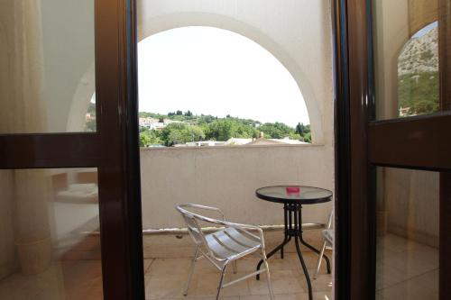 Balkoni atau teres di Magnolia rooms and apartments