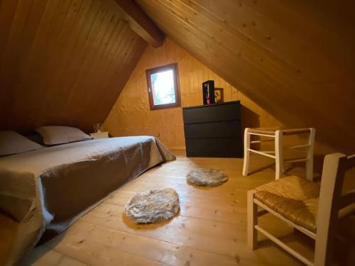 Postel nebo postele na pokoji v ubytování Le chalet de l’Onde