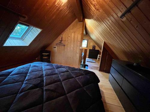 Postel nebo postele na pokoji v ubytování Le chalet de l’Onde