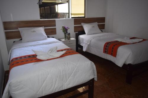 Katil atau katil-katil dalam bilik di Hostel VALLE DORADO MACHUPICCHU