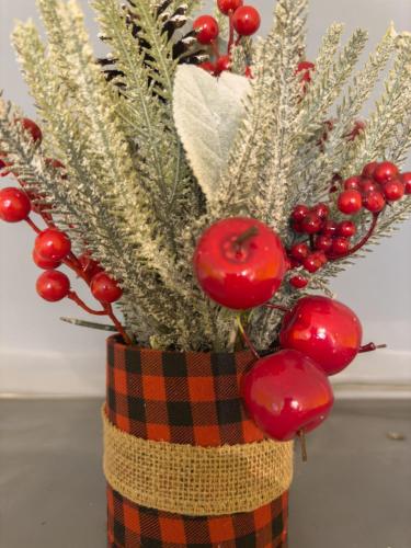 a vase with christmas trees and ornaments at HILL 2 in Golubac