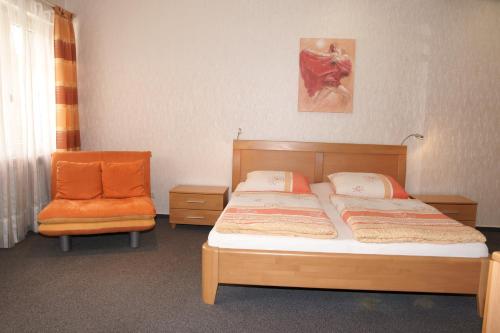 Säng eller sängar i ett rum på Alte Winzerschenke