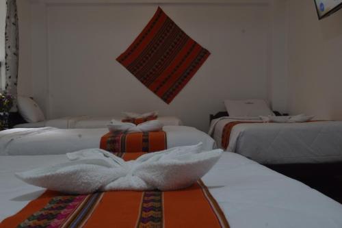 Katil atau katil-katil dalam bilik di Hostel VALLE DORADO MACHUPICCHU