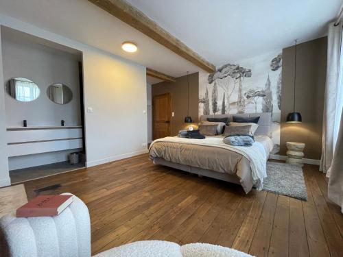 Ένα ή περισσότερα κρεβάτια σε δωμάτιο στο Maison Longue de La Cassine