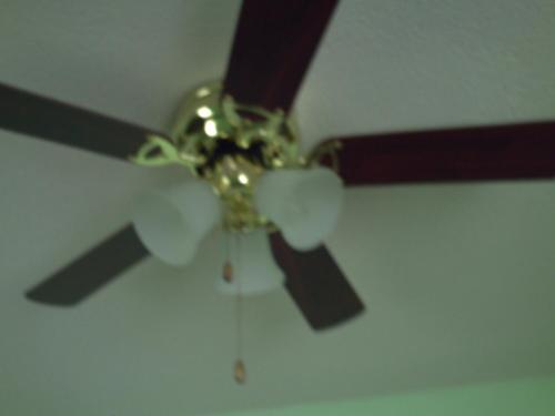 a ceiling fan sitting on top of a ceiling at LeMarida Suites in Saint Peter