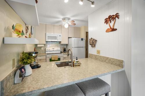 Una cocina o cocineta en Plantation Hale G14