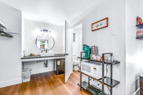 a bathroom with a sink and a toilet at Mount Worthington Room 6 at Mount Walker Inn in Quilcene