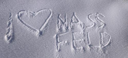 a heart drawn in the sand on the beach at Sonnleitn AlpinWell Appartment (Ski in&out + Wellness) in Hermagor